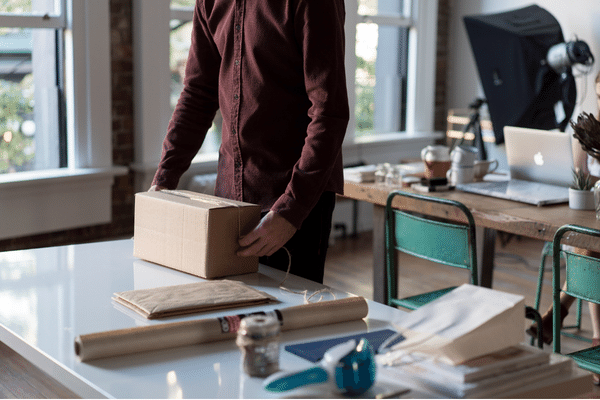 business ideas for women from home. Packing boxes from a home studio